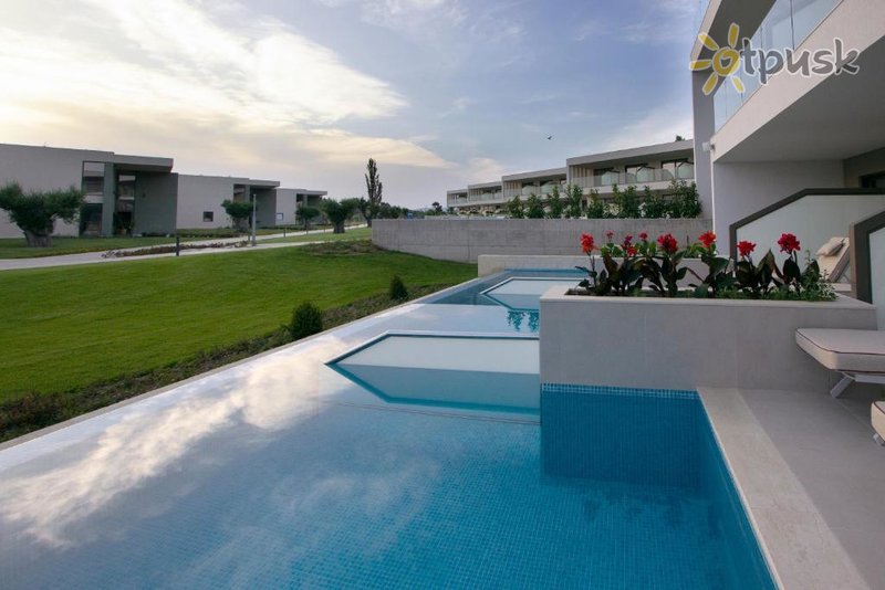 Фото отеля Ammoa Luxury Hotel & Sра Resort 5* Халкидики – Ситония Греция экстерьер и бассейны