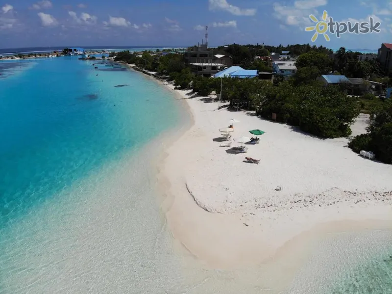 Фото отеля Isla Dhiffushi Guest House 3* Šiaurės Malės atolas Maldyvai papludimys