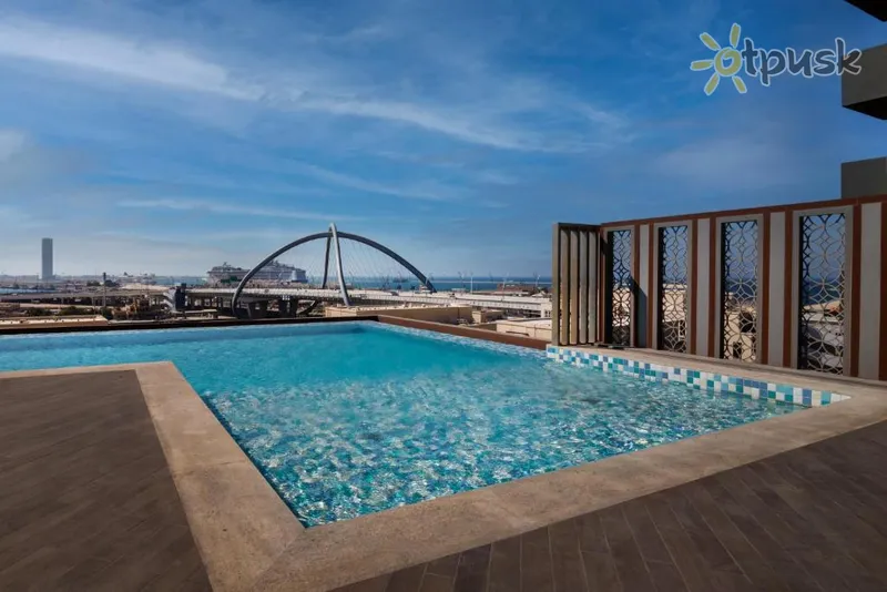 Фото отеля ibis Styles Dubai Deira 3* Дубай ОАЭ экстерьер и бассейны