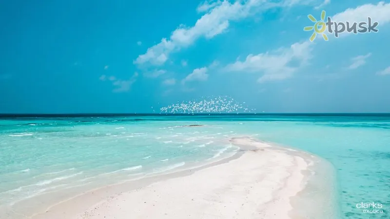 Фото отеля Clarks Exotica, Kamadhoo Maldives 4* Bā atols Maldīvija pludmale