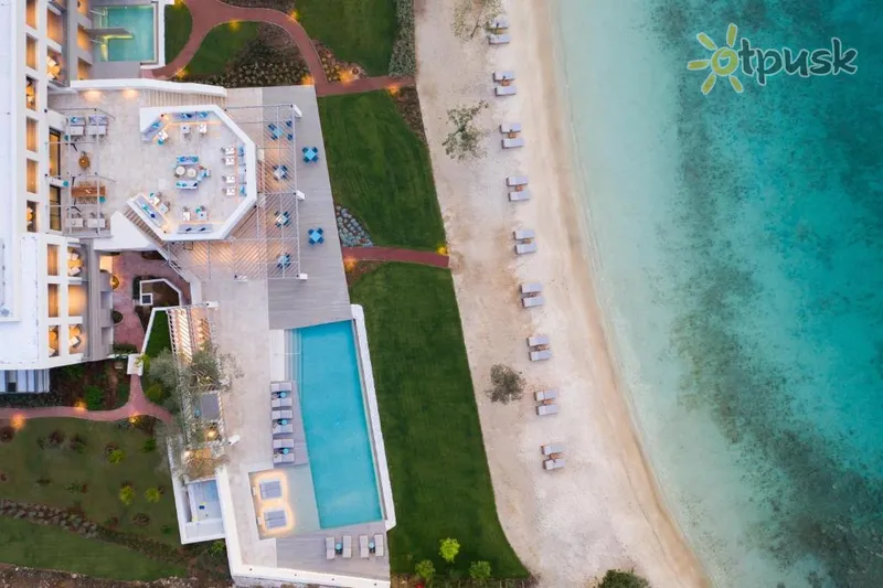 Фото отеля Vathi Cove Luxury Resort & Spa 5* о. Тасос Греция экстерьер и бассейны
