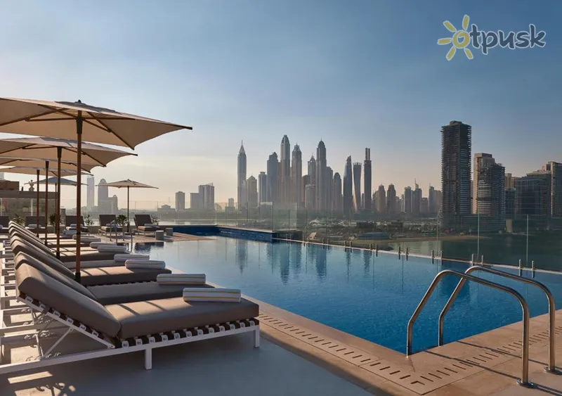 Фото отеля Voco Dubai The Palm 4* Дубай ОАЕ екстер'єр та басейни