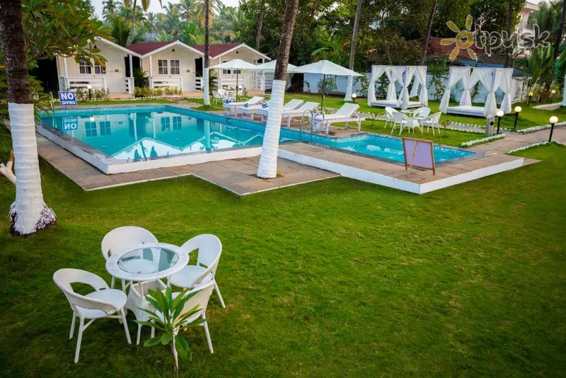 Фото отеля Stone Wood Village Resort, Morjim 3* Северный Гоа Индия экстерьер и бассейны