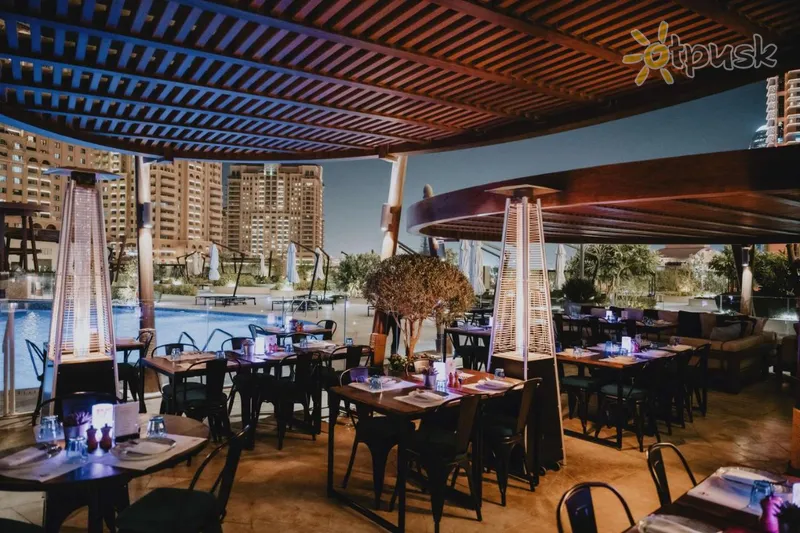 Фото отеля Hilton Doha The Pearl 5* Доха Катар бари та ресторани