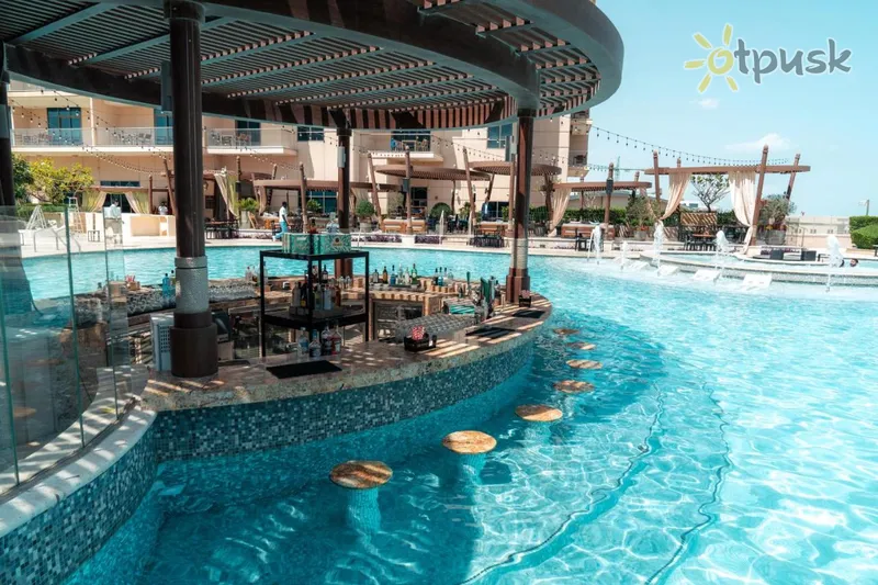 Фото отеля Hilton Doha The Pearl 5* Доха Катар екстер'єр та басейни