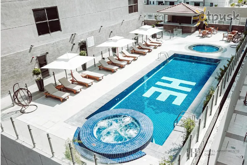 Фото отеля He Hotel Apartments 5* Дубай ОАЕ екстер'єр та басейни