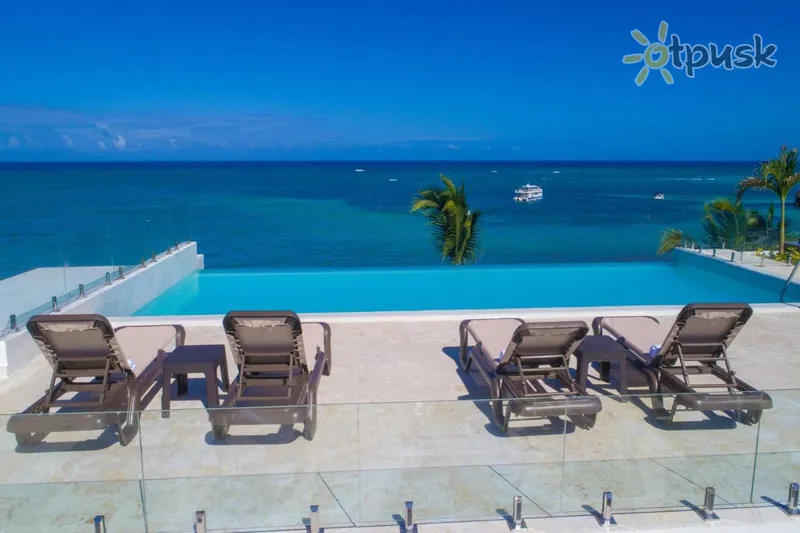 Фото отеля HM Bavaro Beach 4* Пунта Кана Доминикана экстерьер и бассейны