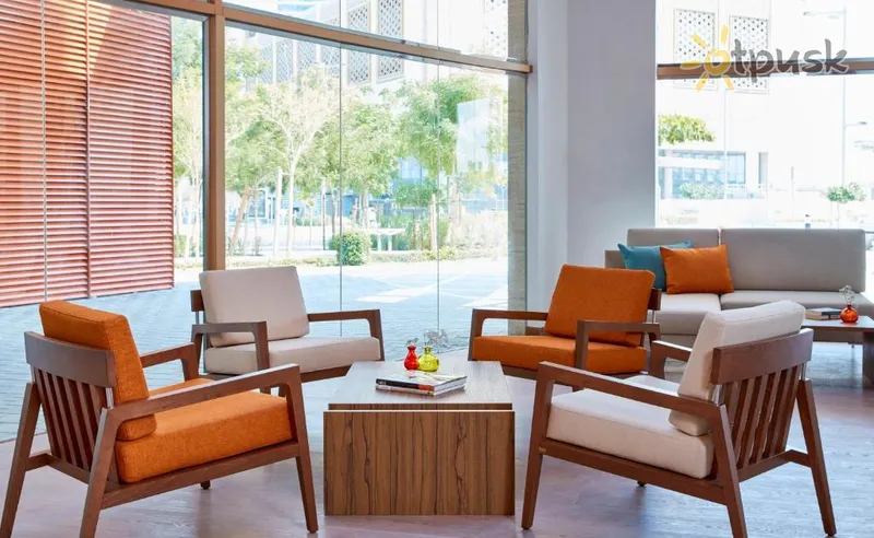 Фото отеля Staybridge Suites Doha Lusail 4* Доха Катар лобби и интерьер