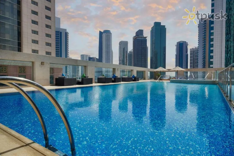 Фото отеля Wyndham Grand Doha West Bay Beach 5* Доха Катар экстерьер и бассейны