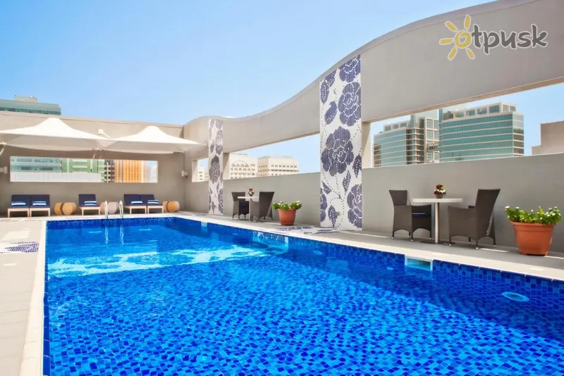Фото отеля Oaks Liwa Executive Suites 4* Абу Даби ОАЭ экстерьер и бассейны