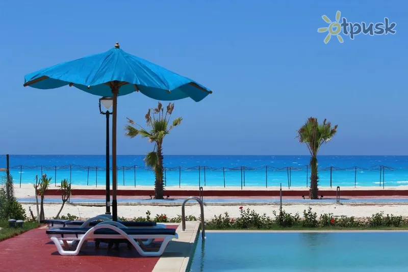 Фото отеля Tolip North Coast 5* El Alameinas Egiptas 