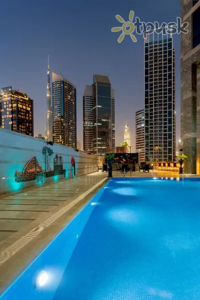 Фото отеля Grand Millennium Business Bay 5* Дубай ОАЭ экстерьер и бассейны