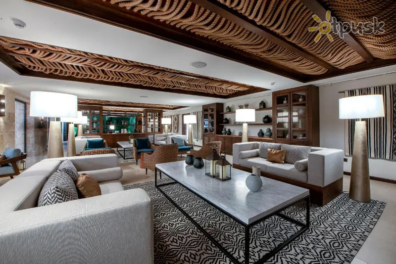 Фото отеля Unique Club At Lopesan Costa Bavaro 5* Баваро Домінікана лобі та інтер'єр