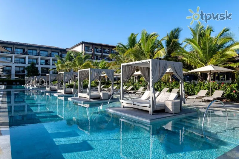 Фото отеля Unique Club At Lopesan Costa Bavaro 5* Баваро Домінікана екстер'єр та басейни