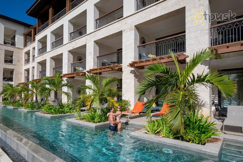 Фото отеля Unique Club At Lopesan Costa Bavaro 5* Баваро Домінікана екстер'єр та басейни