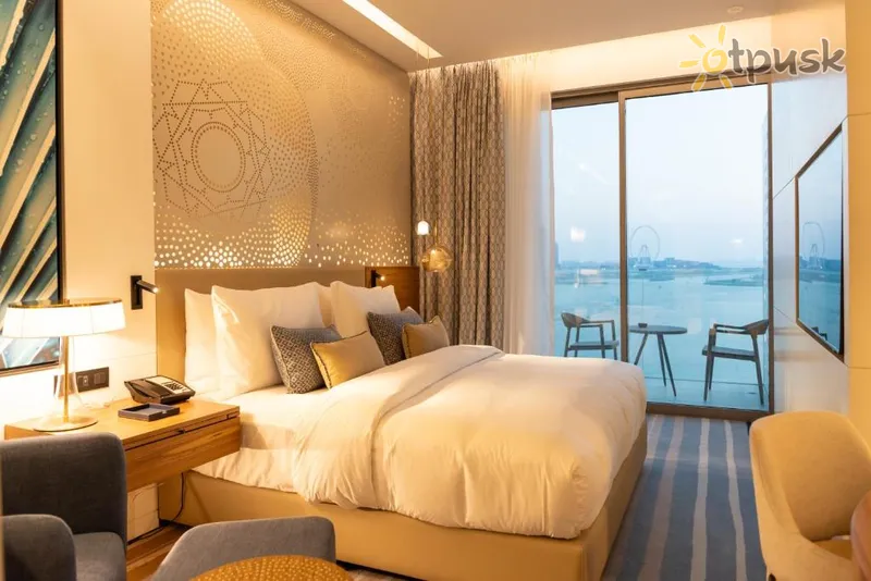 Фото отеля Tumbi West Palm Beach Hotel Dubai, Tapestry Collection Hilton 4* Дубай ОАЭ экстерьер и бассейны
