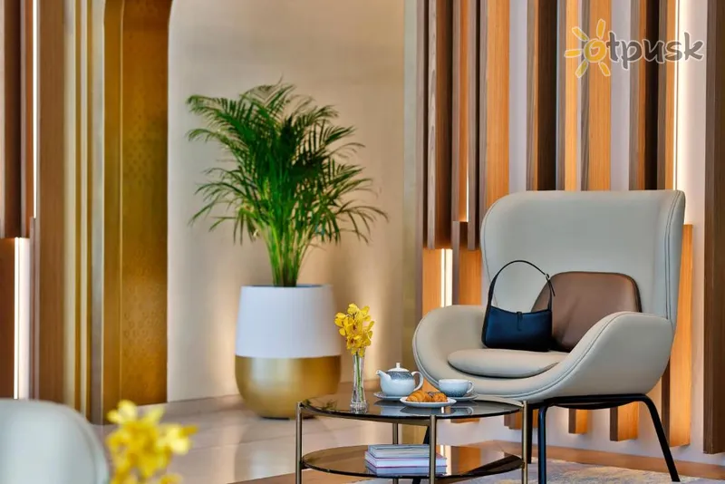 Фото отеля Tumbi West Palm Beach Hotel Dubai, Tapestry Collection Hilton 4* Дубай ОАЭ экстерьер и бассейны