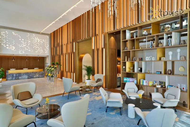 Фото отеля Tumbi West Palm Beach Hotel Dubai, Tapestry Collection Hilton 4* Дубай ОАЭ экстерьер и бассейны