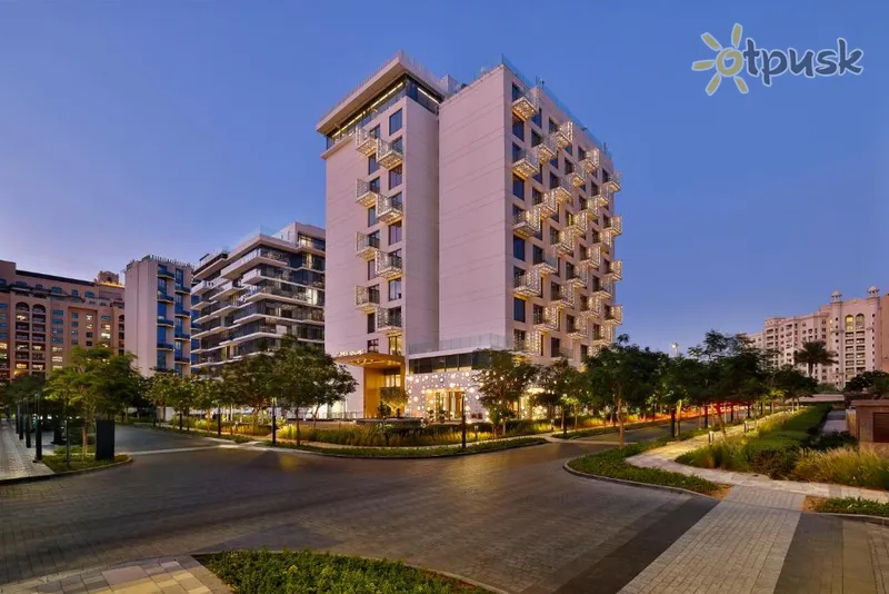 Фото отеля Tumbi West Palm Beach Hotel Dubai, Tapestry Collection Hilton 4* Дубай ОАЭ экстерьер и бассейны