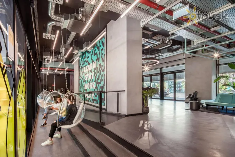Фото отеля The Social Hub Bologna 4* Болонья Италия лобби и интерьер