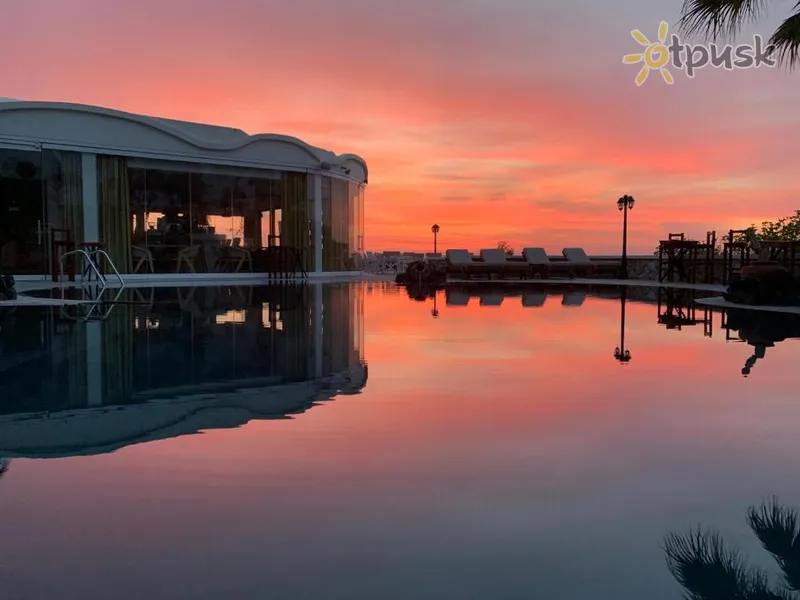 Фото отеля Manos Villa 4* о. Санторіні Греція екстер'єр та басейни