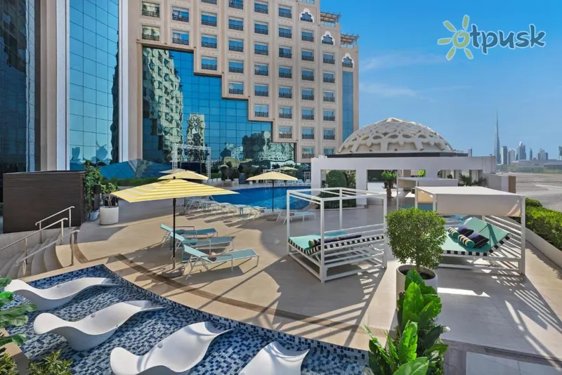 Фото отеля Barcelo Al Jaddaf 5* Дубай ОАЭ экстерьер и бассейны