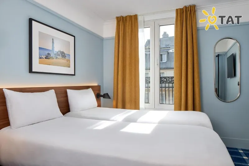Фото отеля Timhotel Paris Gare du Nord 3* Париж Франция номера