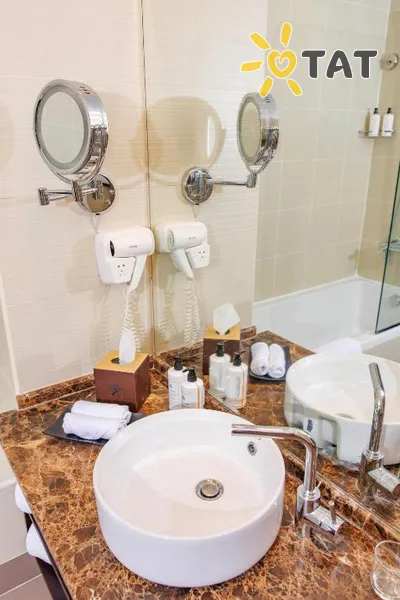 Фото отеля Jannah Executive Hotel Apartments 4* Абу Даби ОАЭ номера