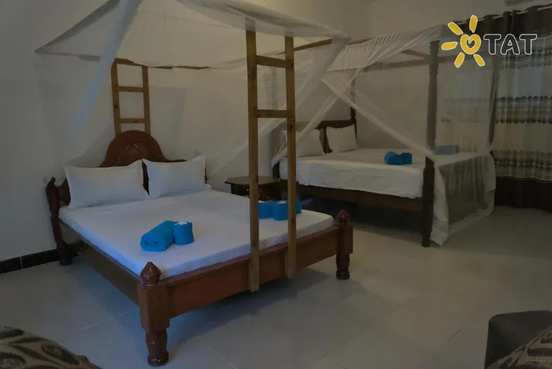 Фото отеля Cocolala Beach House 4* Нунгви Танзания номера