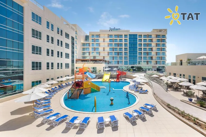 Фото отеля Radisson Resort Ras Al Khaimah Marjan Island 4* Рас Аль-Хайма ОАЭ экстерьер и бассейны