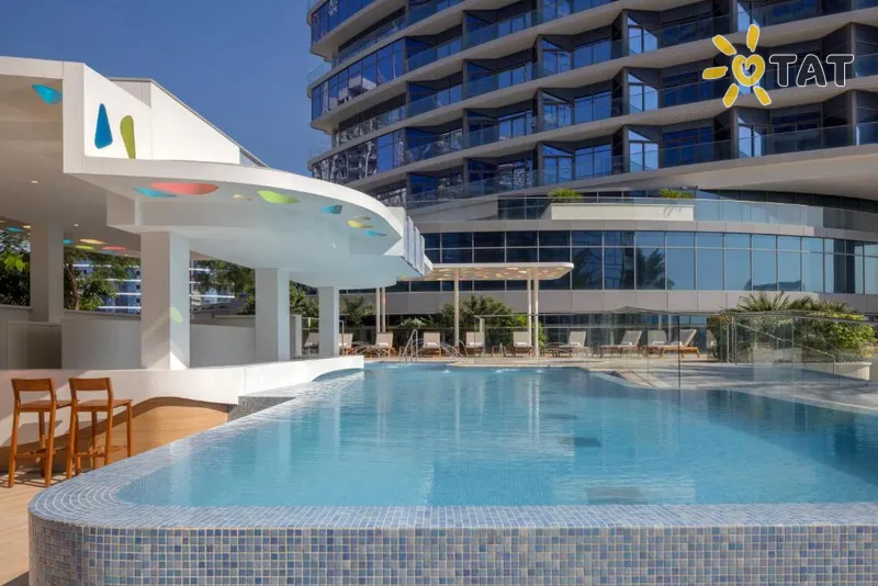 Фото отеля Hilton Dubai Creek Hotel & Residences 5* Dubaija AAE ārpuse un baseini