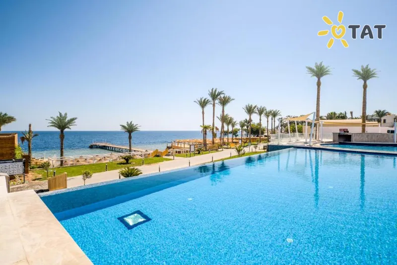 Фото отеля Sunrise Diamond Beach Resort Grand Select 5* Шарм эль Шейх Египет экстерьер и бассейны
