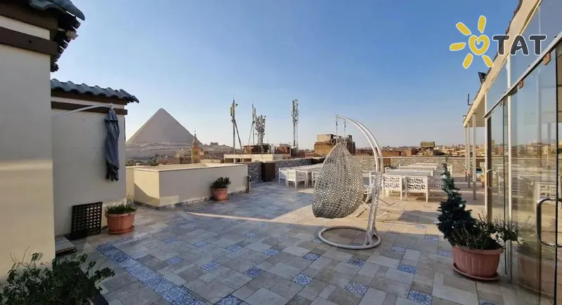 Фото отеля Pyramid Edge Hotel 3* Каир Египет экстерьер и бассейны