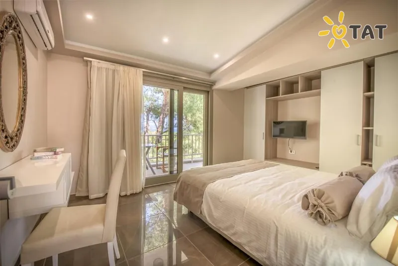 Фото отеля Koukounaria Hotel & Suites 4* о. Закинф Греция номера