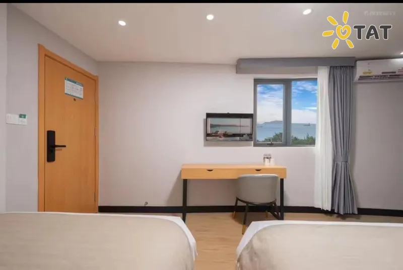 Фото отеля Guan Hai Lou Hotel 3* о. Хайнань Китай номера