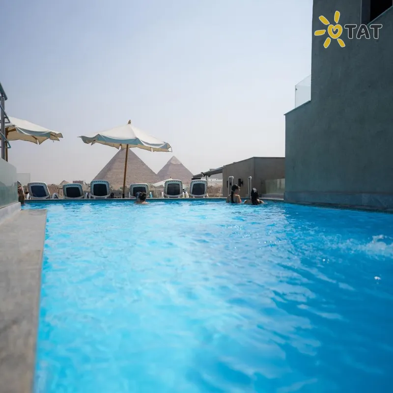 Фото отеля Pyramid Front Hotel 4* Каир Египет экстерьер и бассейны